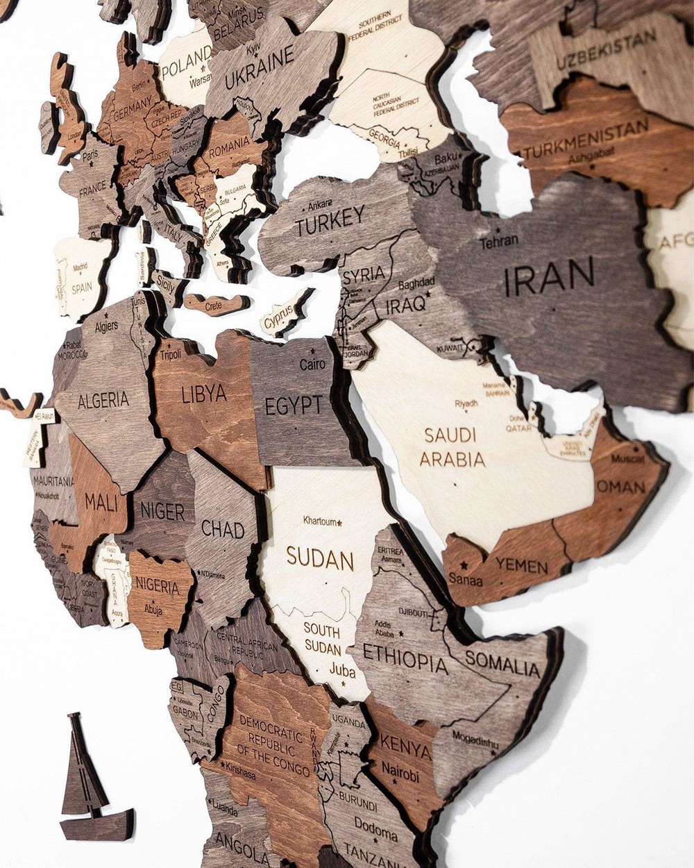 3D wooden map on the wall continents