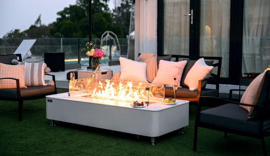 Luxury coffee table with integrated gas fireplace white marble