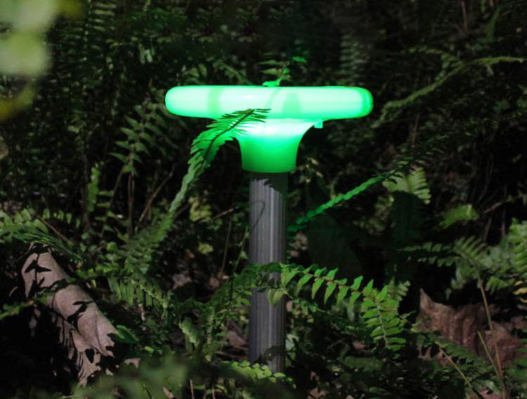 Mole repellent with decorative LED lamp