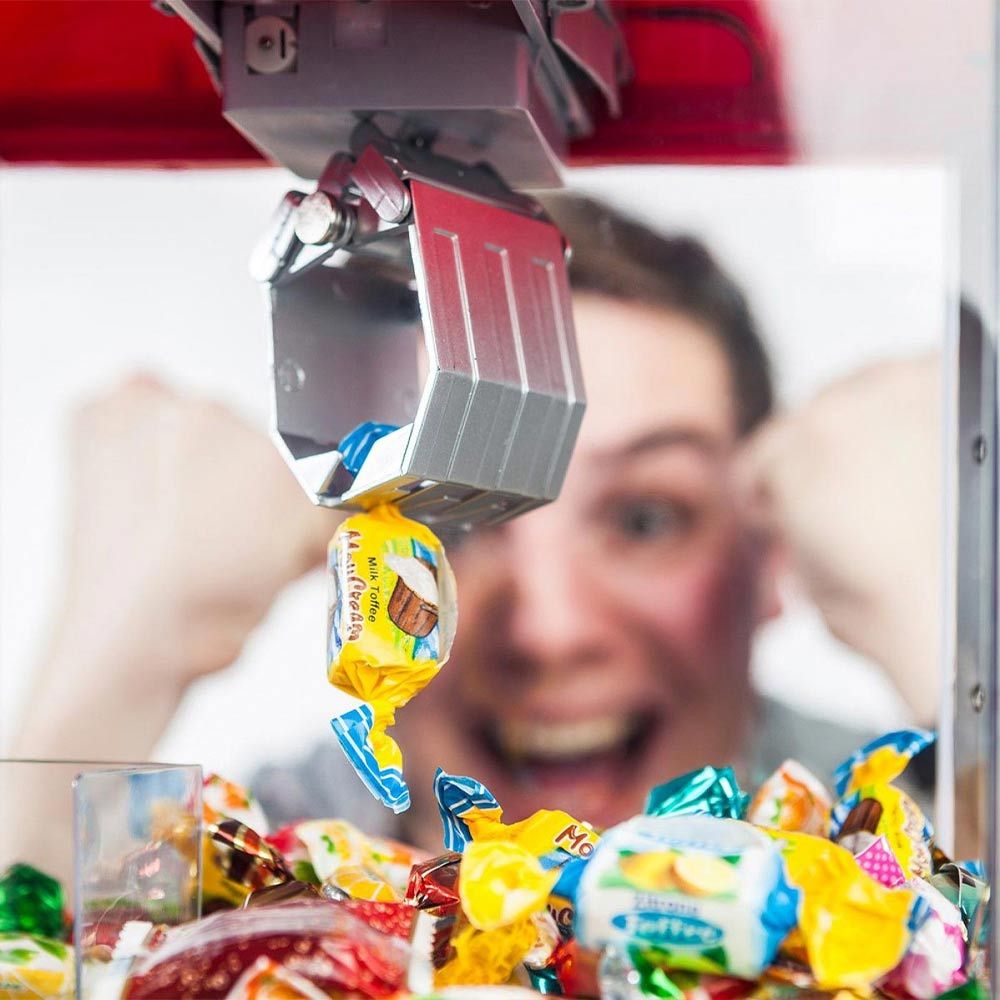 Grab Candy or toy machine dispenser for grabbing sweets or candies