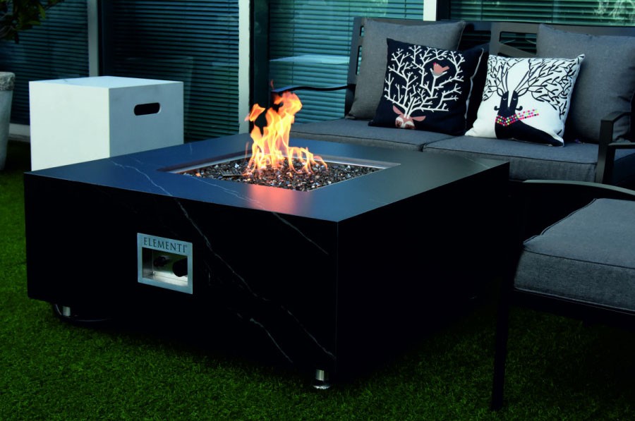 ceramic luxury table with black marble fireplace