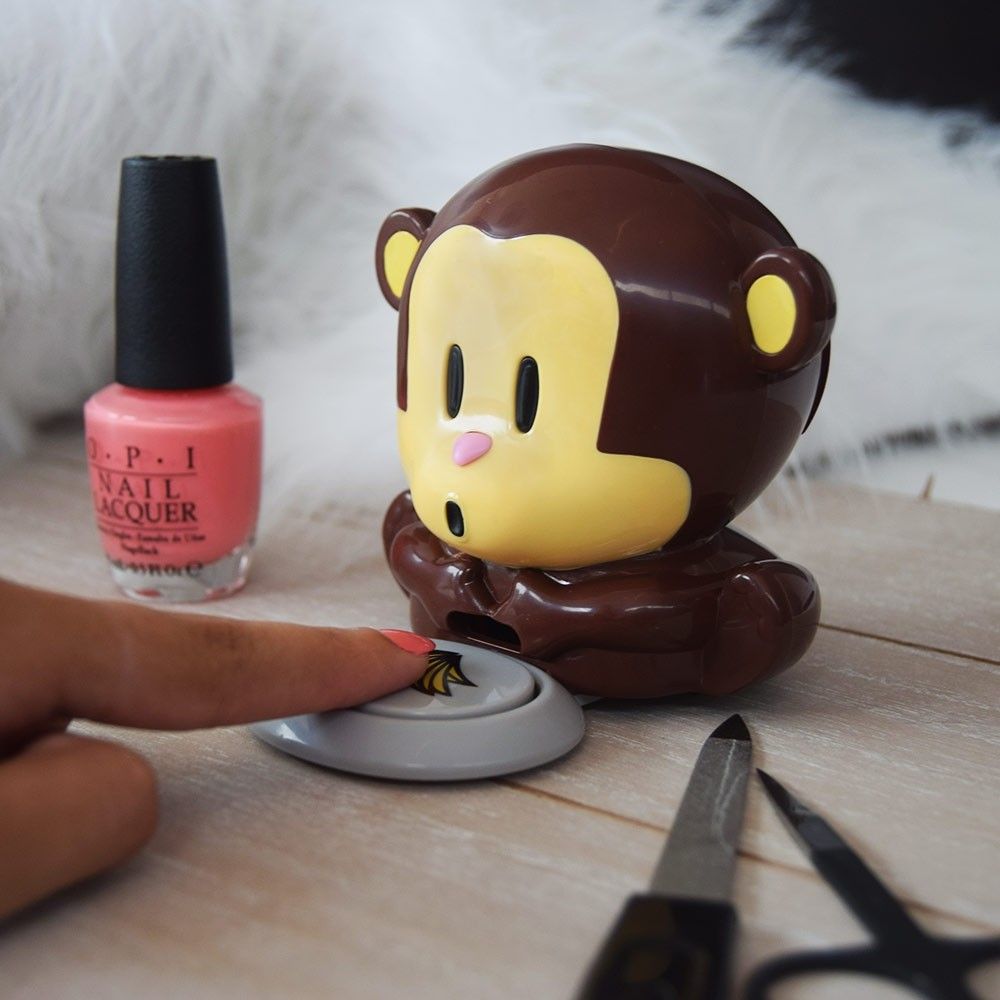 Nail polish dryer in the shape of a monkey