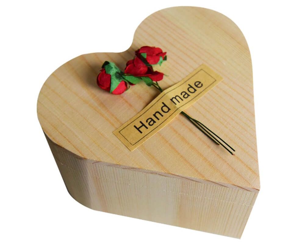 rose in a heart shaped box from wood