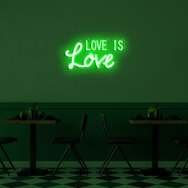 3D neon LED logo on the wall - Love is Love with dimensions of 50 cm