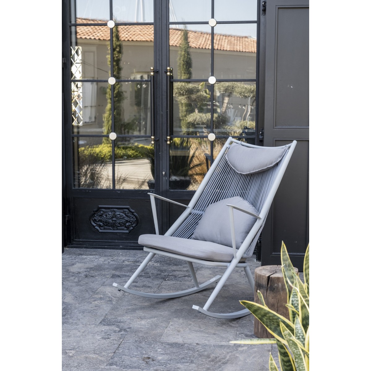 rocking armchair on the terrace metal aluminum garden