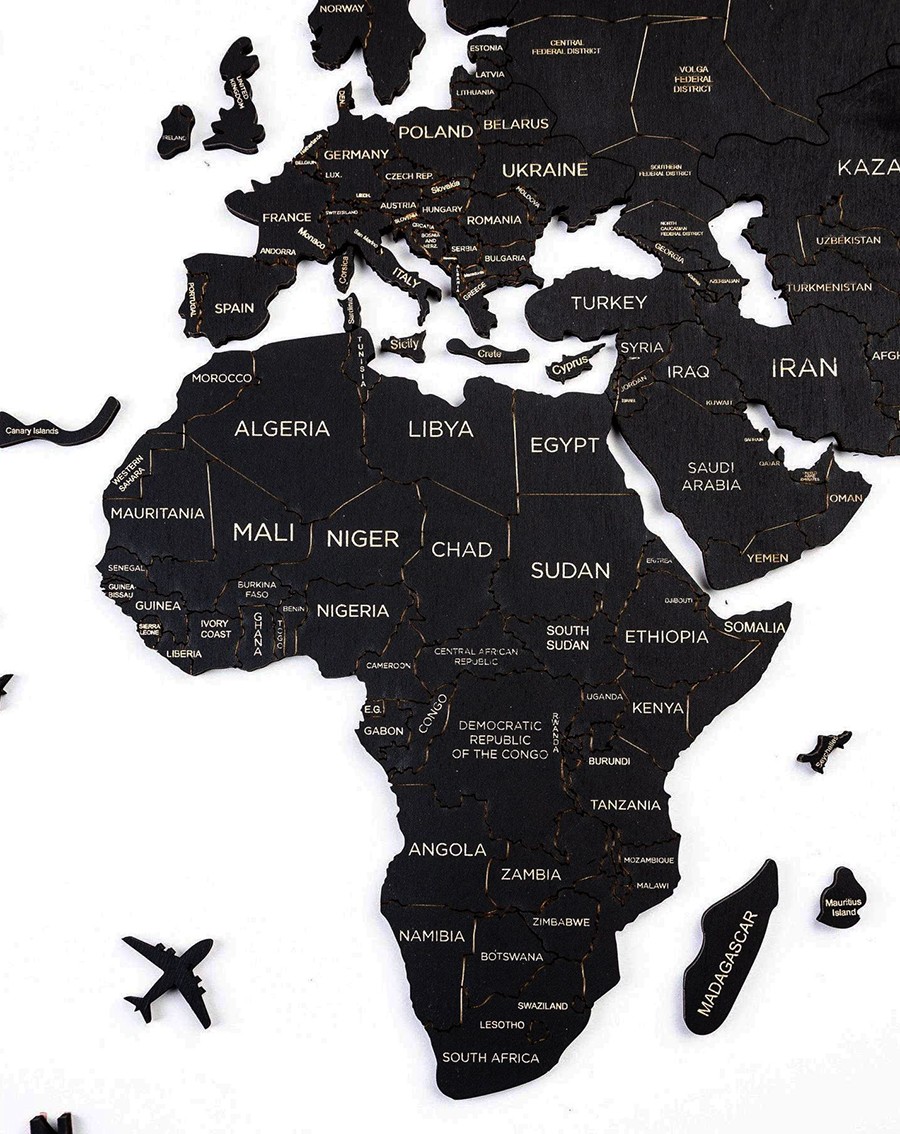 world wooden map on the wall continents black color