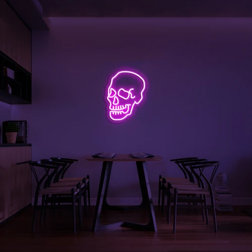 3D glowing neon logo on a wall of skull