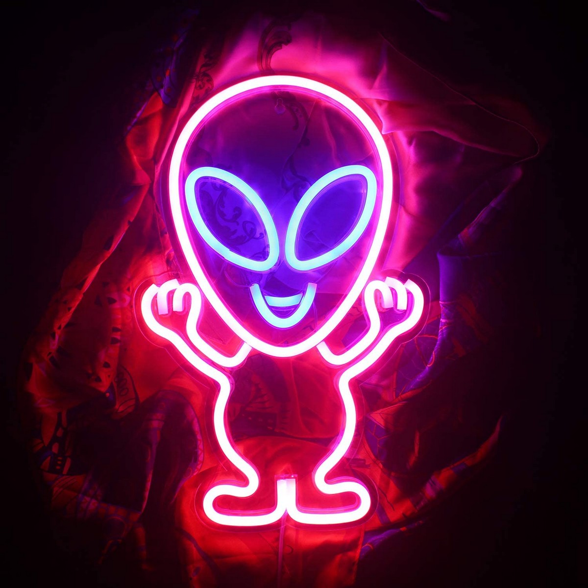 led neon logo shining on the wall - alien